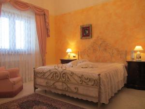 Uma cama ou camas num quarto em Vignali Residence