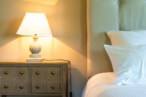 New Cottage & spa de nage Guesthouse客房内的一张或多张床位