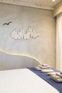 Posteľ alebo postele v izbe v ubytovaní Estia Boutique Apartments