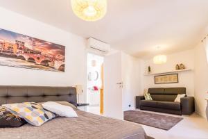 מיטה או מיטות בחדר ב-Antico Rione