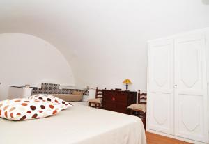 Кровать или кровати в номере Bella Baia Relais