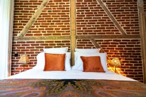 New Cottage & spa de nage Guesthouse客房内的一张或多张床位