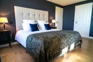 New Cottage & spa de nage Guesthouse客房内的一张或多张床位