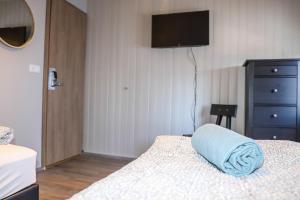 Lava Guesthouse客房内的一张或多张床位