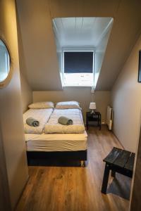 Lava Guesthouse客房内的一张或多张床位