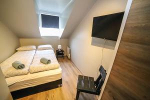 Lava Guesthouse客房内的一张或多张床位