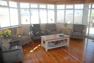 Area soggiorno di Tuskar House by the Sea