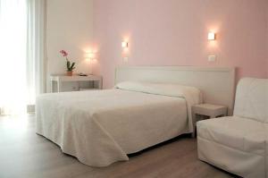 Posteľ alebo postele v izbe v ubytovaní Maree Hotel