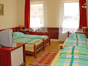 Postel nebo postele na pokoji v ubytování Botax Motel