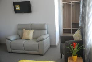 Area soggiorno di Tuskar House by the Sea