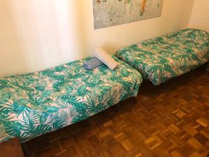 Posteľ alebo postele v izbe v ubytovaní MONKEY Apartment
