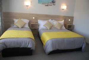 Letto o letti in una camera di Tuskar House by the Sea