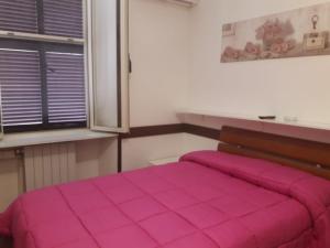 Letto o letti in una camera di Albergo Ollolai