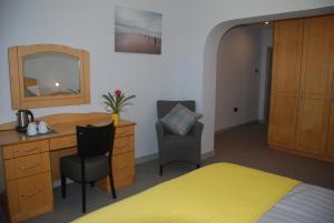 Letto o letti in una camera di Tuskar House by the Sea