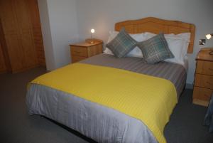 Letto o letti in una camera di Tuskar House by the Sea