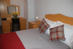 Letto o letti in una camera di Tuskar House by the Sea