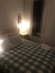 Postel nebo postele na pokoji v ubytování Apartamento Completo Santa Marina