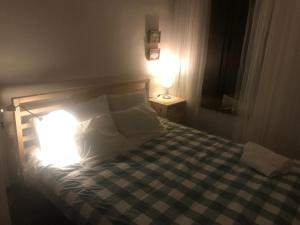 Postel nebo postele na pokoji v ubytování Apartamento Completo Santa Marina