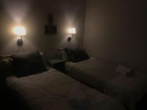 Postel nebo postele na pokoji v ubytování Apartamento Completo Santa Marina