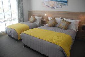 Letto o letti in una camera di Tuskar House by the Sea