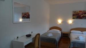 Postel nebo postele na pokoji v ubytování Guest House Mamut