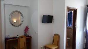 TV a/nebo společenská místnost v ubytování Guest House Mamut