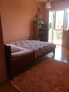 Postel nebo postele na pokoji v ubytování Apartments Stevo Nikočević
