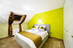 Postel nebo postele na pokoji v ubytování B&B Villa Curtricias