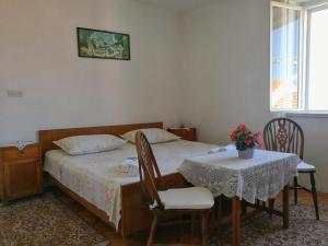 Ένα ή περισσότερα κρεβάτια σε δωμάτιο στο Guesthouse Lidija