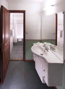 Ванная комната в Hotel Panzió Nr100 Aparthotel konyha nélkül