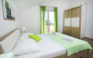Posteľ alebo postele v izbe v ubytovaní Apartments Nemira Exclusive + 14 fotografií