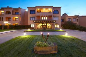 Сад в La Costa Hotel Golf & Beach Resort