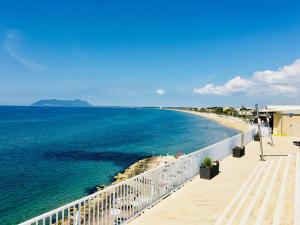 a view of the ocean from the balcony of a house at Grand Hotel L'Approdo in Terracina