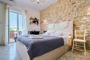 Posteľ alebo postele v izbe v ubytovaní Apartments Rija