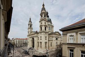a large building with two towers on top of it at Hotel Central Basilica in Budapest
