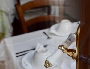 a close up of a bathroomaucet on a table at Residenza Le Logge in Gubbio