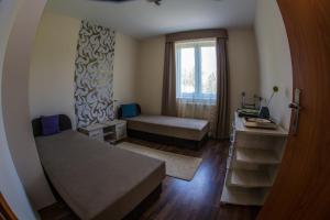 Posteľ alebo postele v izbe v ubytovaní Aqua Line Apartmanház