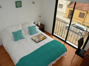 Rúm í herbergi á B&B Hostel CasaMoro