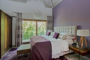 Postel nebo postele na pokoji v ubytování Campo Bahia Hotel Villas Spa