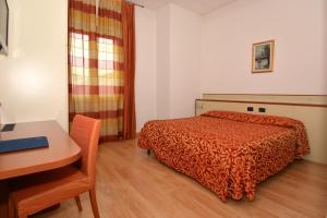 Ένα ή περισσότερα κρεβάτια σε δωμάτιο στο Hotel Eolo +29 φωτογραφίες