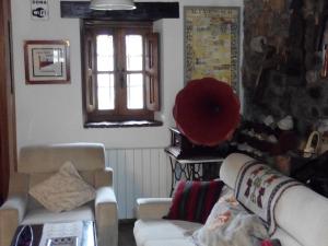 Uma área de estar em Posada Montero de la Concha