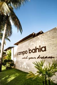 un panneau indiquant le campo balija pour tous vos besoins dans l'établissement Campo Bahia Hotel Villas Spa, à Santo André