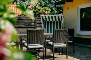 a group of chairs and a table on a patio at Harztor in Nordhausen