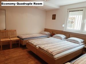 Postel nebo postele na pokoji v ubytování Guest House Edem II