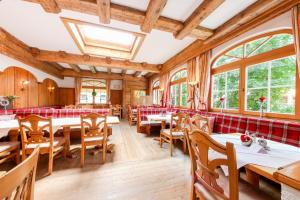 Reštaurácia alebo iné gastronomické zariadenie v ubytovaní Hotel Dax