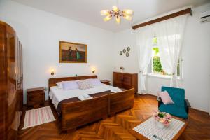 a bedroom with a large bed in a room at Apartment Liliana in Split