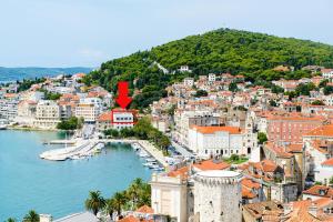 an aerial view of a city with a red arrow at Belvedere Luxury Rooms - Breathtaking View in Split