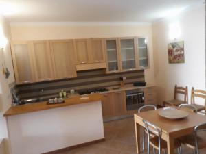 A kitchen or kitchenette at Casa vacanze Filomena