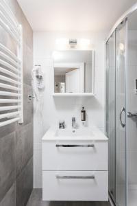 Kúpeľňa v ubytovaní Salomea Krakow apartments