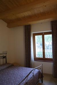 Postel nebo postele na pokoji v ubytování Albergo Bice